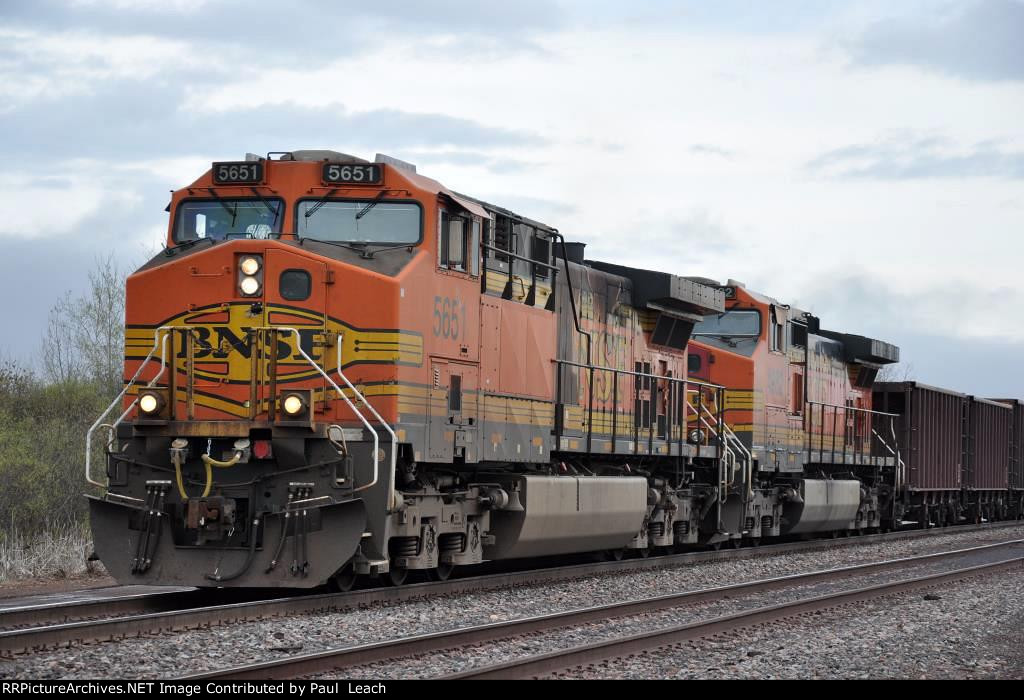 Ore empties ease out of yard